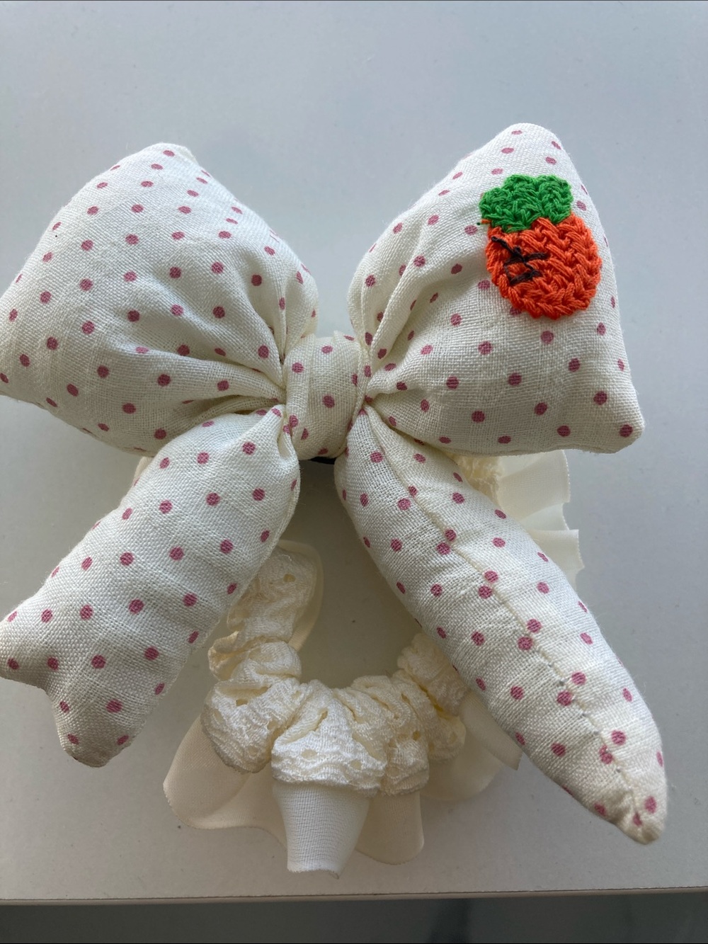 Heath Ceramics Cream Polka Dot Bow Hair Tie with Orange Strawberry Accent